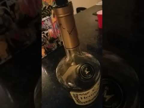 ¿Cuánto pesa una botella de licor de 1 75?